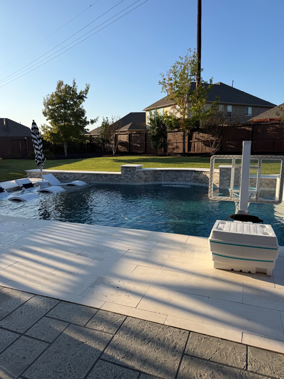 Pool deck after pressure washing - daytime
